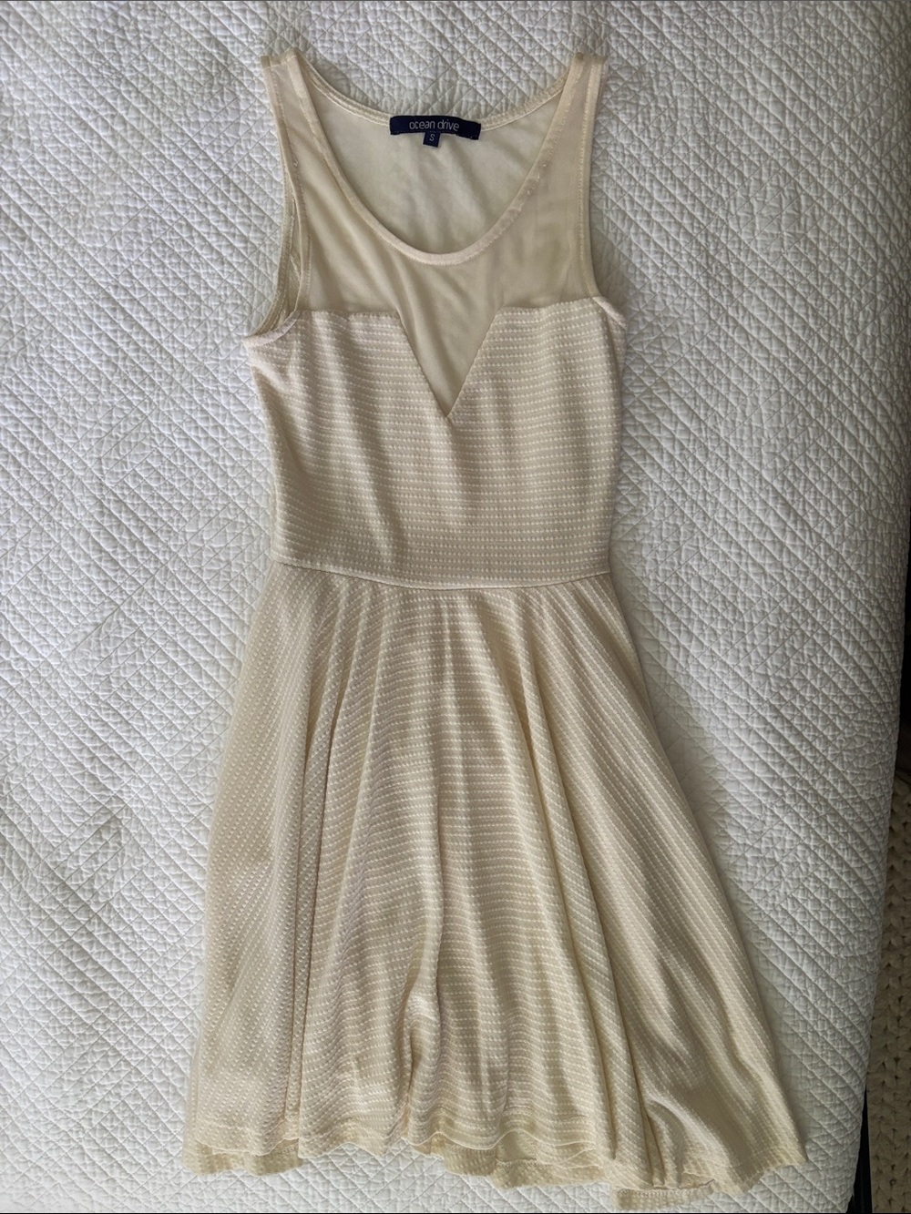 Cream mini dress with sheer neck & back